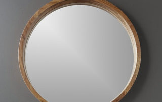 wood framed round wall mirror