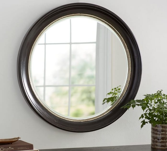 round mirror with wooden frame