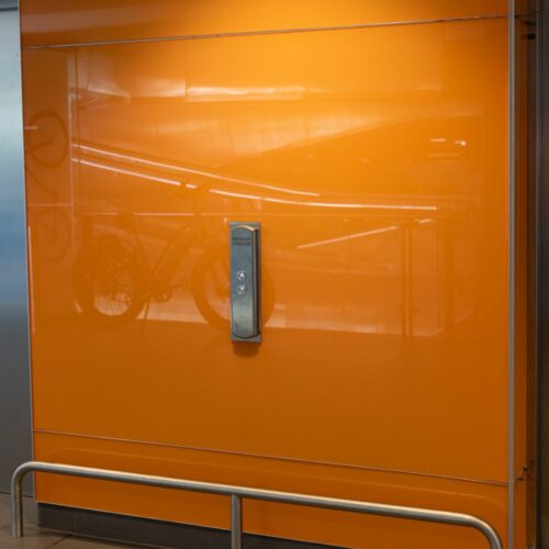 orange coloured splashback Majestic Glass_Project Syd International Airport P7 (19)