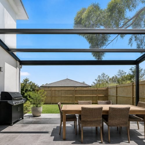 Custom glass roof over an alfresco area on a Sydney home